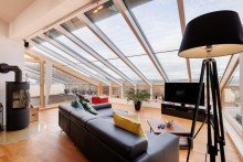 ...mit wundervollem Glasdach... Architektonisches & energetisches Meisterwerk in Toplage!