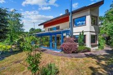Gartenansicht Exklusives Wohnensemble in traumhafter Feldrandlage | Einliegerwohnung & Naturpanorama inklusive